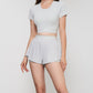 Soft Fabric Cross Hem Crop Top With Pad